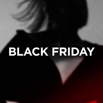 Black Friday text overlay on a silhouette of a person wearing a red garment.